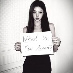 (B)Artist Holds a Sign